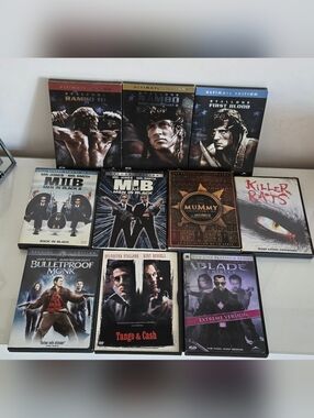 10 DVDs With 12 Movies Titles. Killer Rats, MIB, Rambo, The Mummy, Blade ......